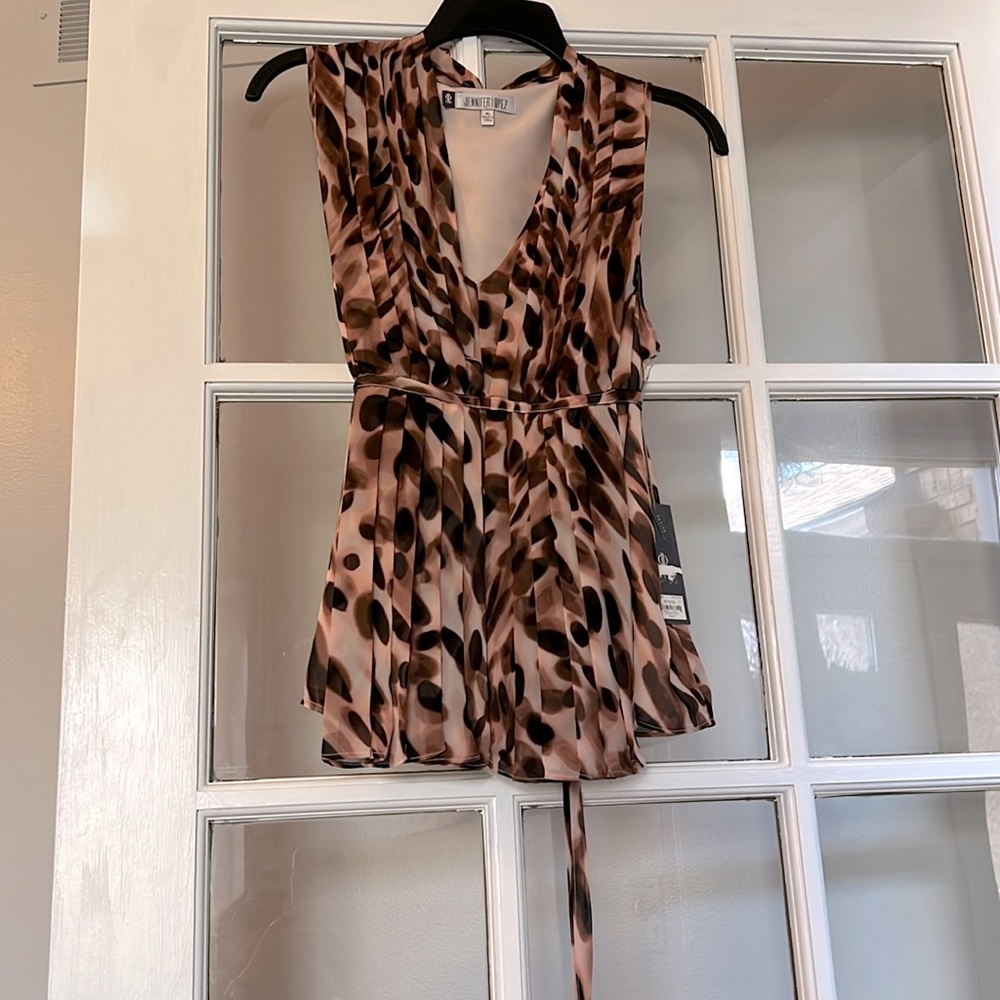 Women’s top by Jennifer Lopez.  Just a beautiful soft lined women’s top.